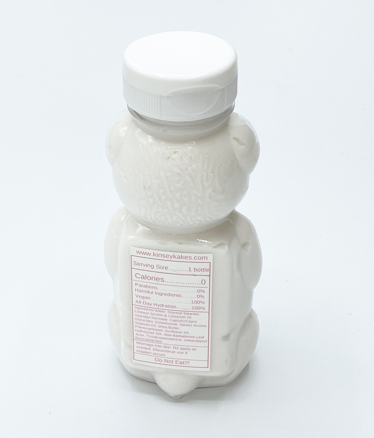 Suga Bare Confetti Cake scent Lotion in honey bear bottle - back