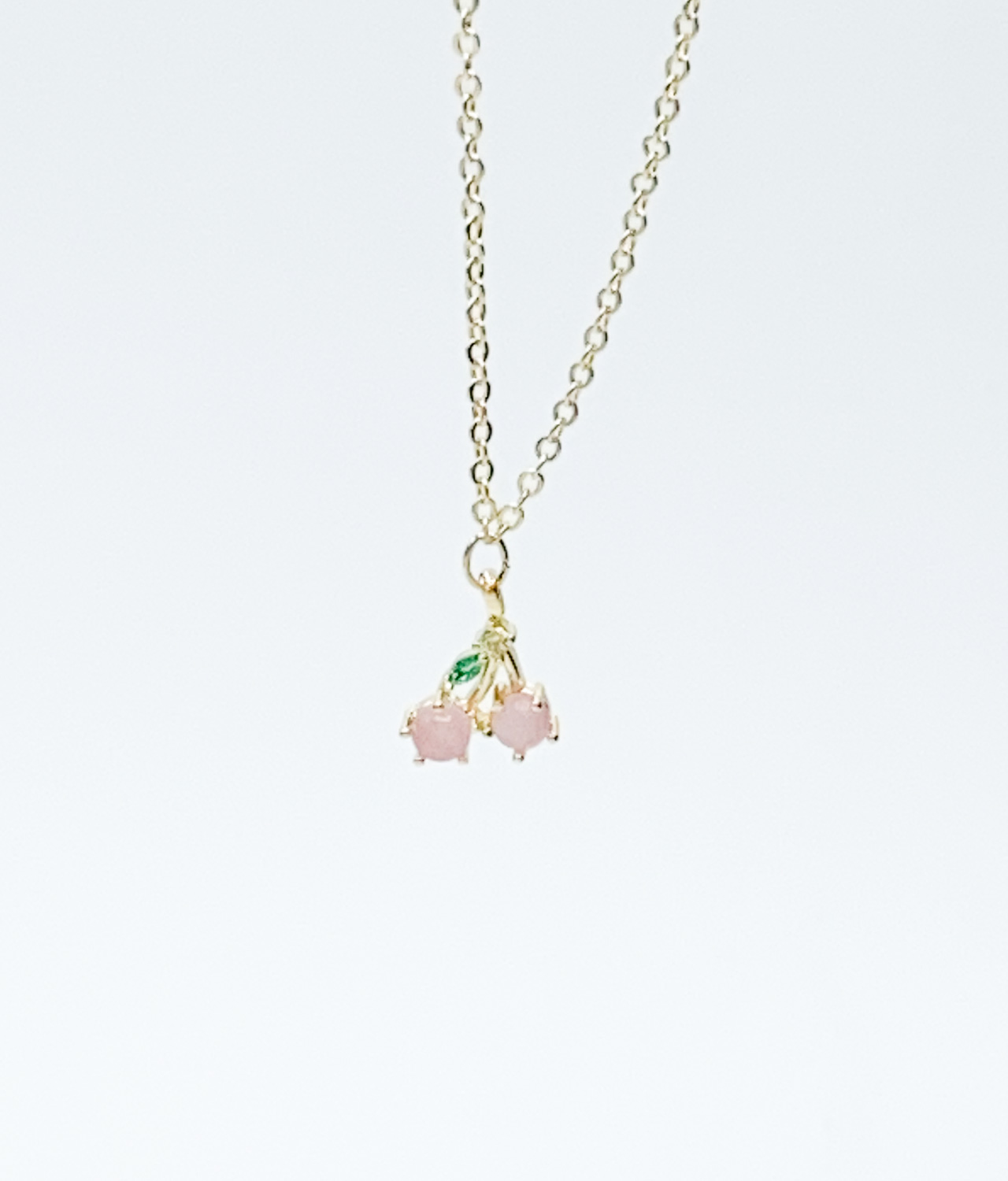 This cherry necklace for girls with cubic zirconia stones is a sweet symbol of friendship — a perfect gift for tweens who love sparkle and meaning.