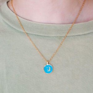 Turquoise Enamel Moon Pendant Necklace on Girl