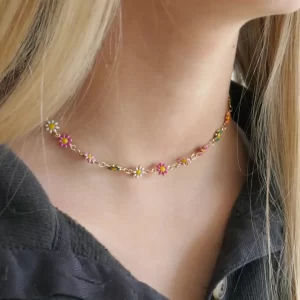 Enamel flower necklace on neck