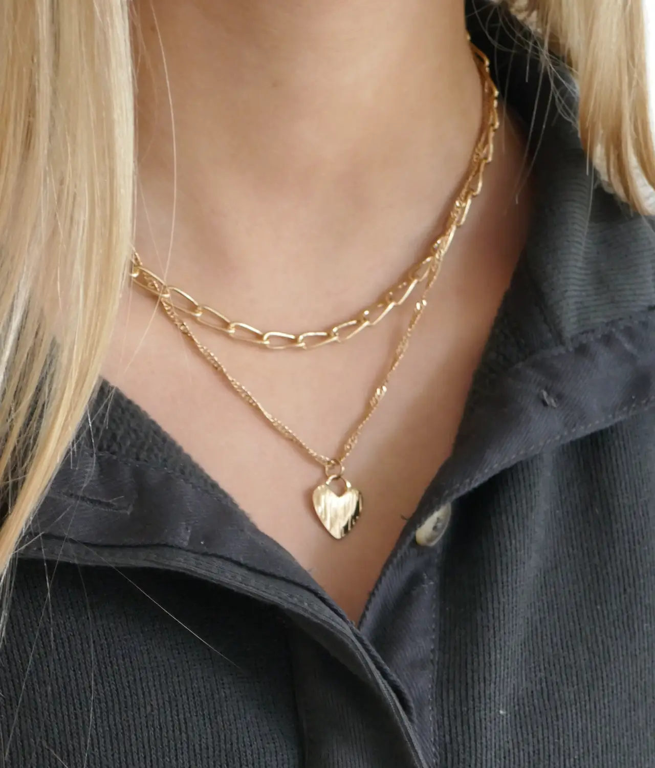 Double chain gold necklace with heart - on girls neck
