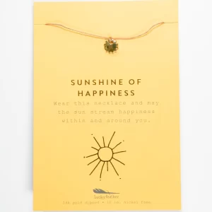Gold sunshine pendant necklace on package