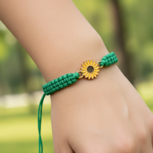 Sunflower charm bracelet with bright green woven band and gold bead ends on girls wrist