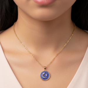 Girl wearing celestial moon necklace on gold chain