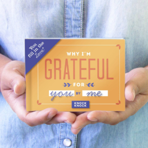 Girl holding “Why I’m Grateful” gift book — ideal for tween girls to express appreciation