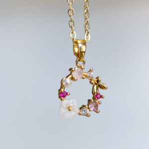 Gold floral wreath necklace closeup